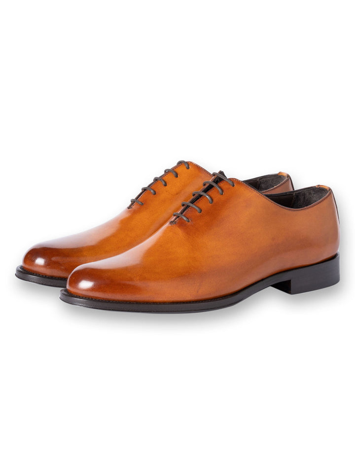 Men's brown leather oxford dress shoes with black laces