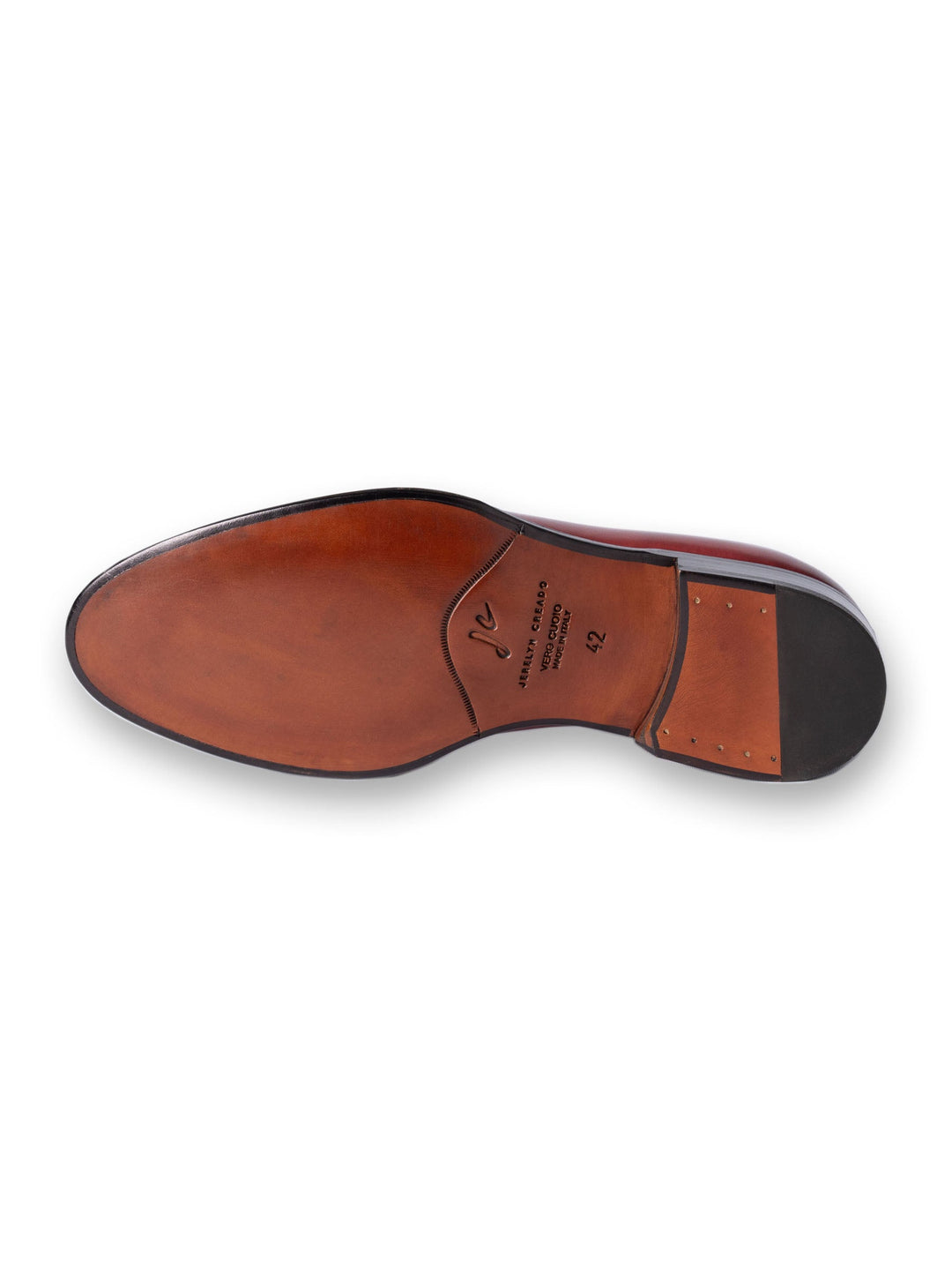 Brown leather sole of a men's dress shoe with engraved brand and size details