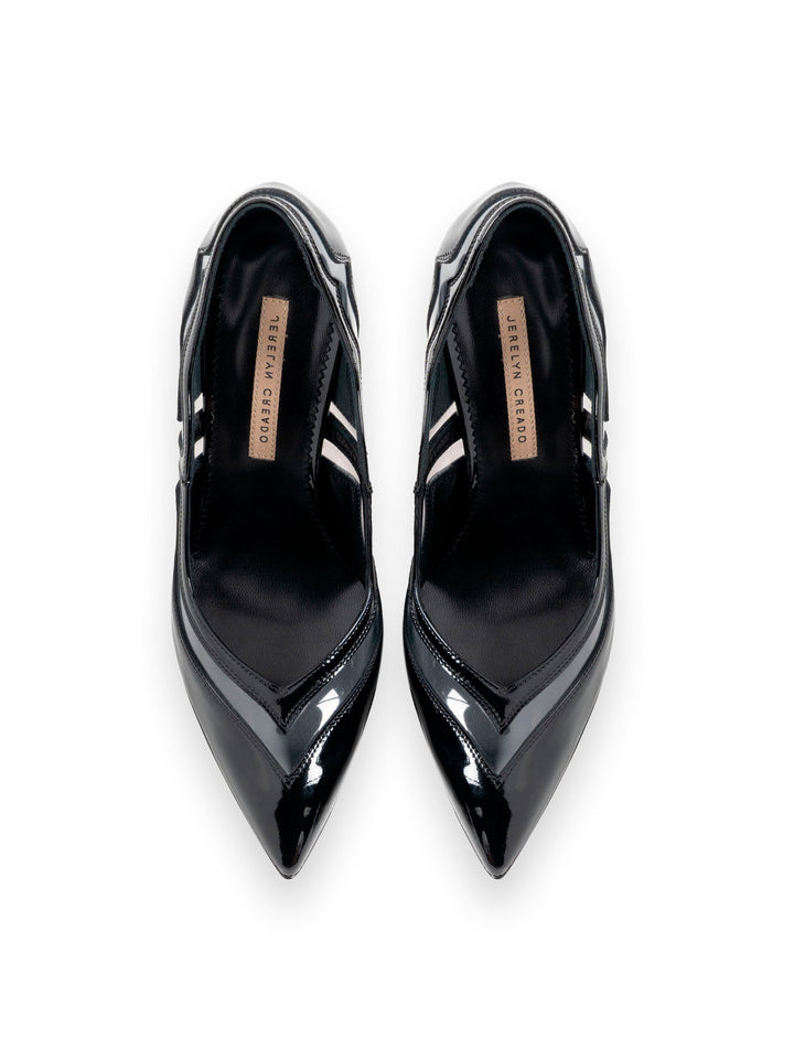 Black patent leather pointed-toe high heels with brand label on insole