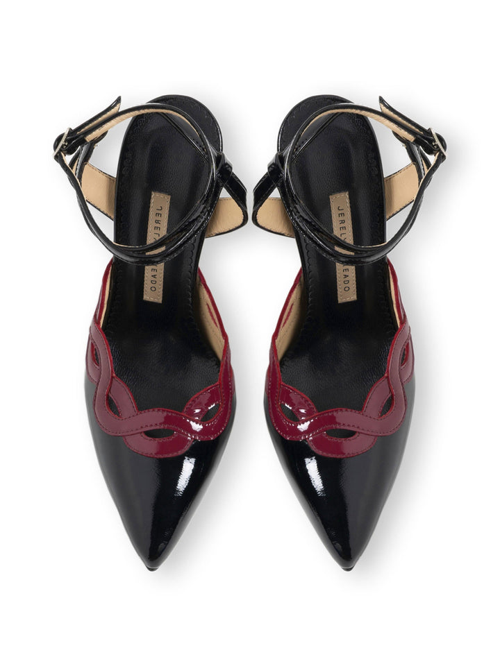 Black and burgundy patent leather women's heels with ankle straps