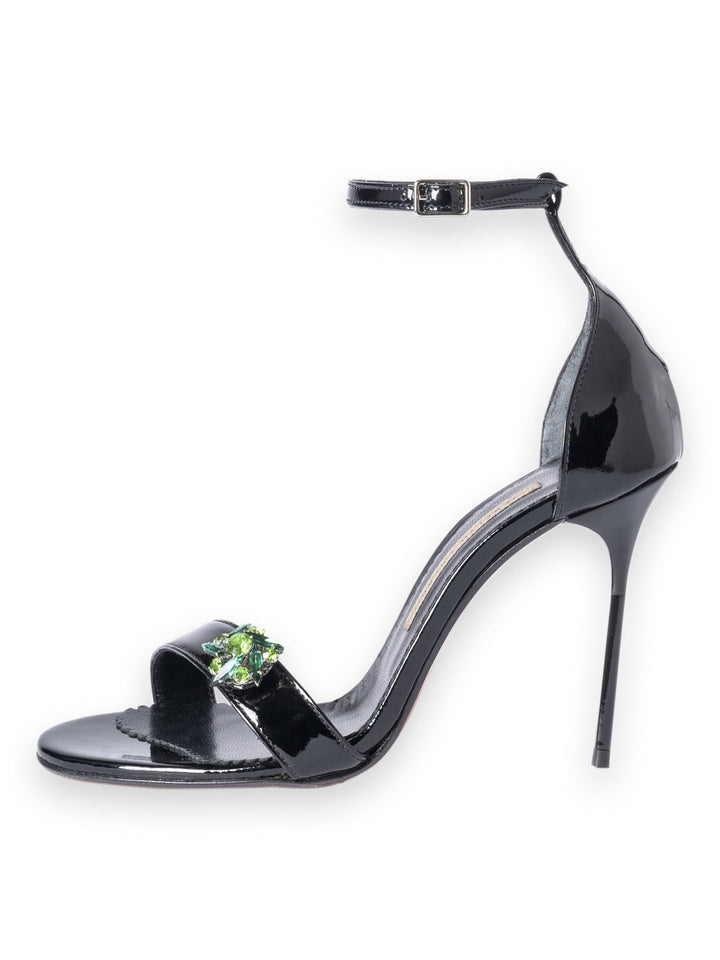 Stylish black high heel sandal with ankle strap and decorative gem