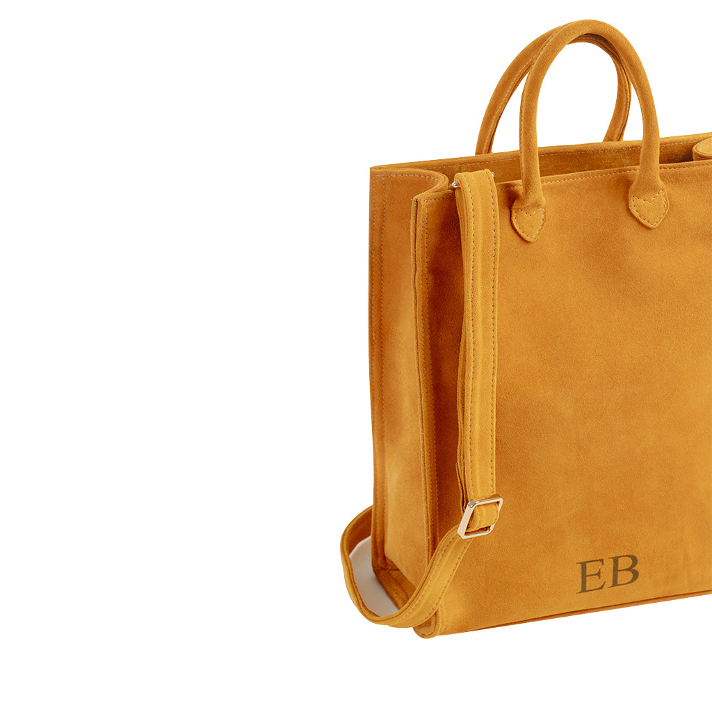 Mustard yellow leather tote bag with EB monogram