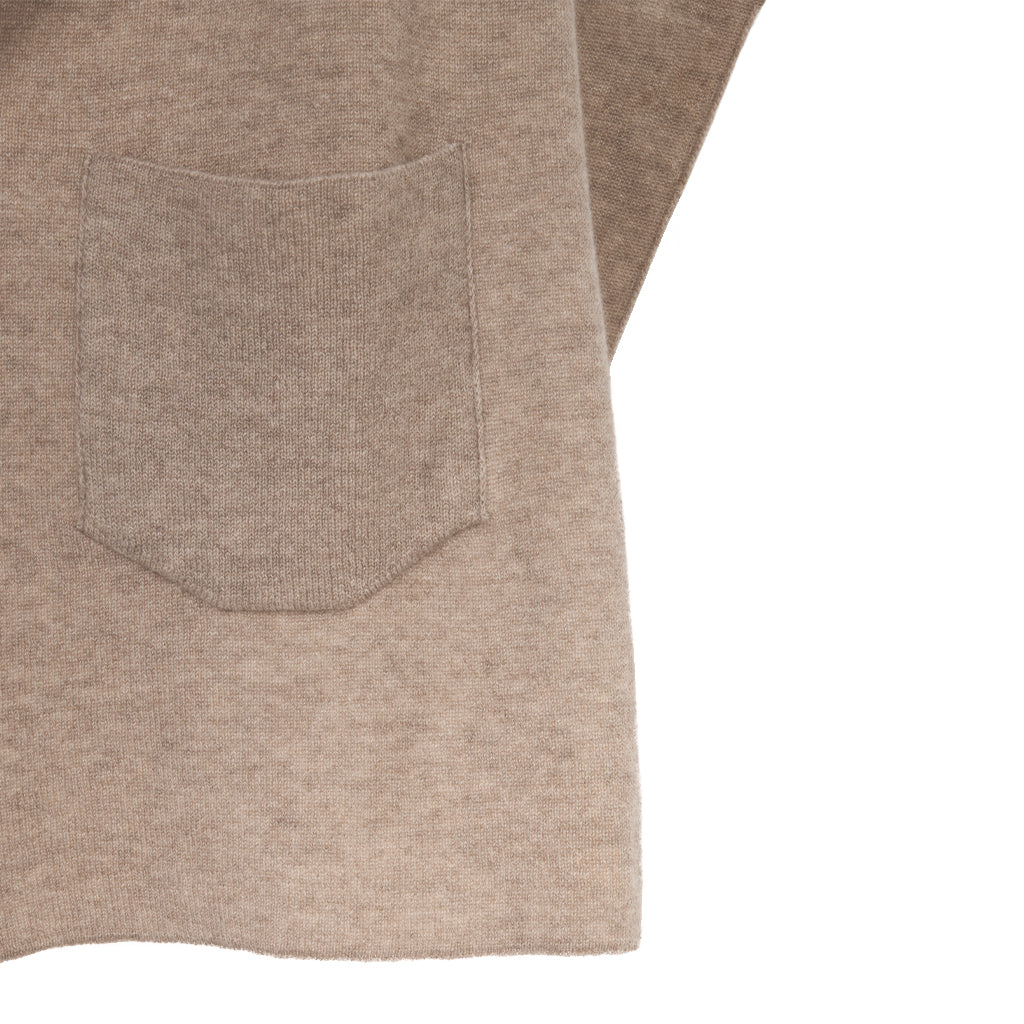 Beige wool sweater with pocket on white background