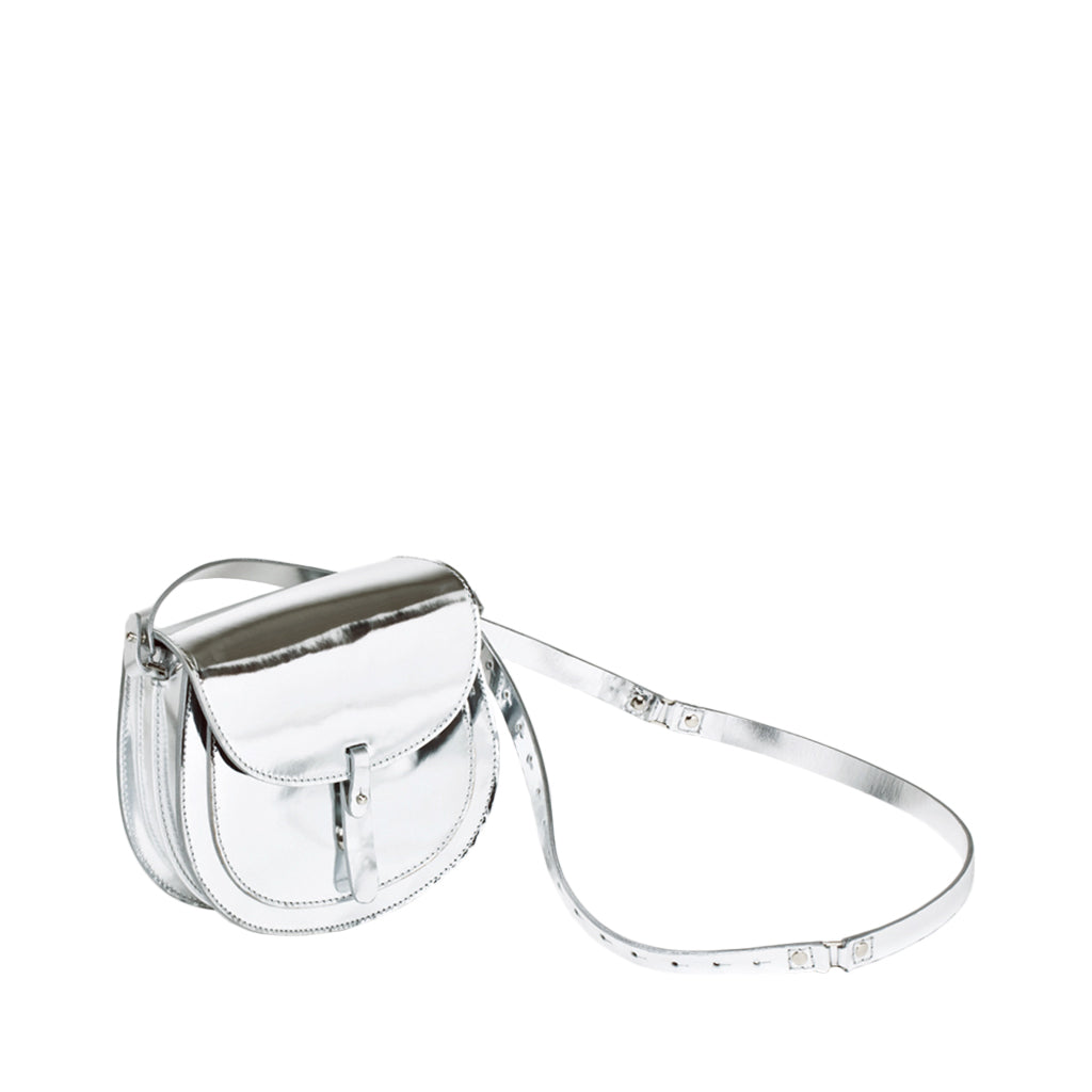 Silver crossbody bag with adjustable strap and front flap closure