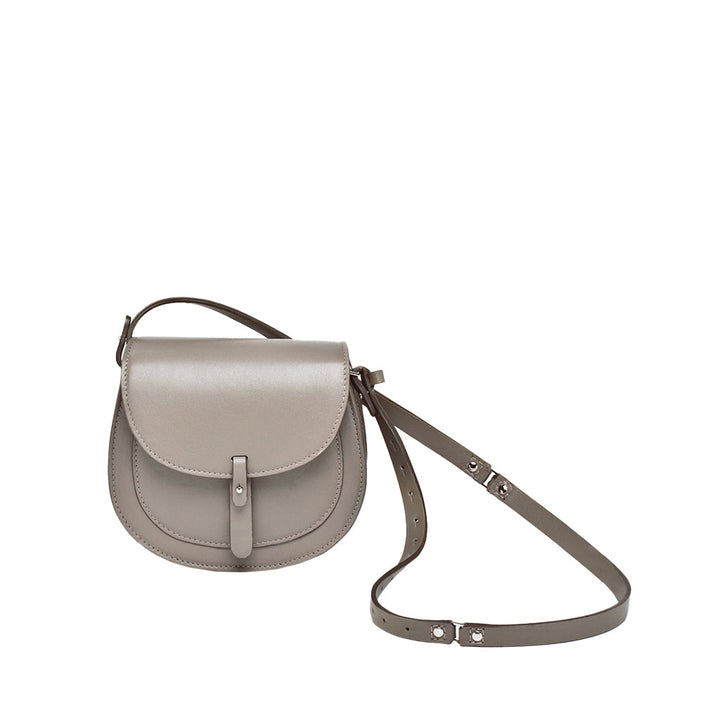 Gray leather crossbody bag with adjustable strap and front flap closure