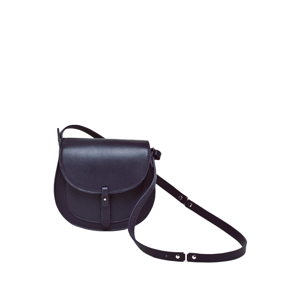 Black leather crossbody saddle bag with adjustable strap