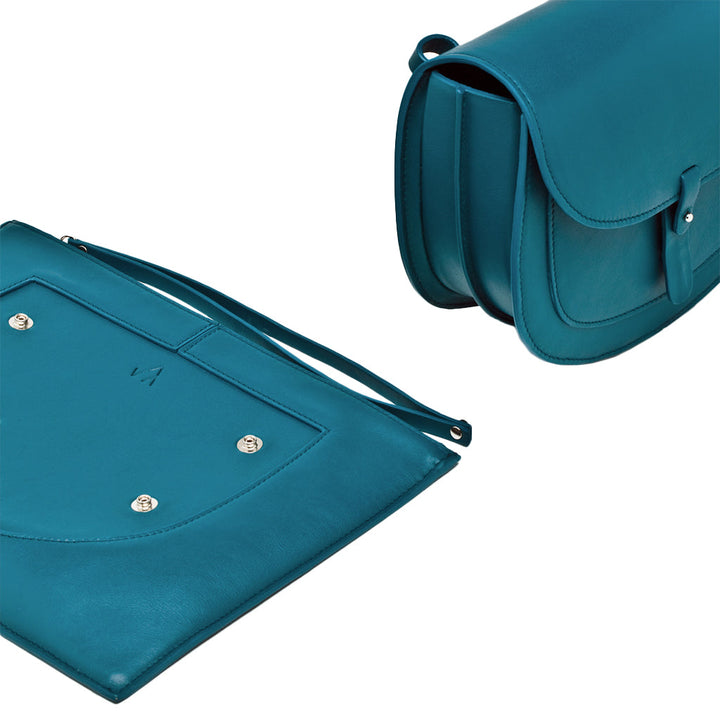 Teal leather handbag and matching portfolio clutch on white background