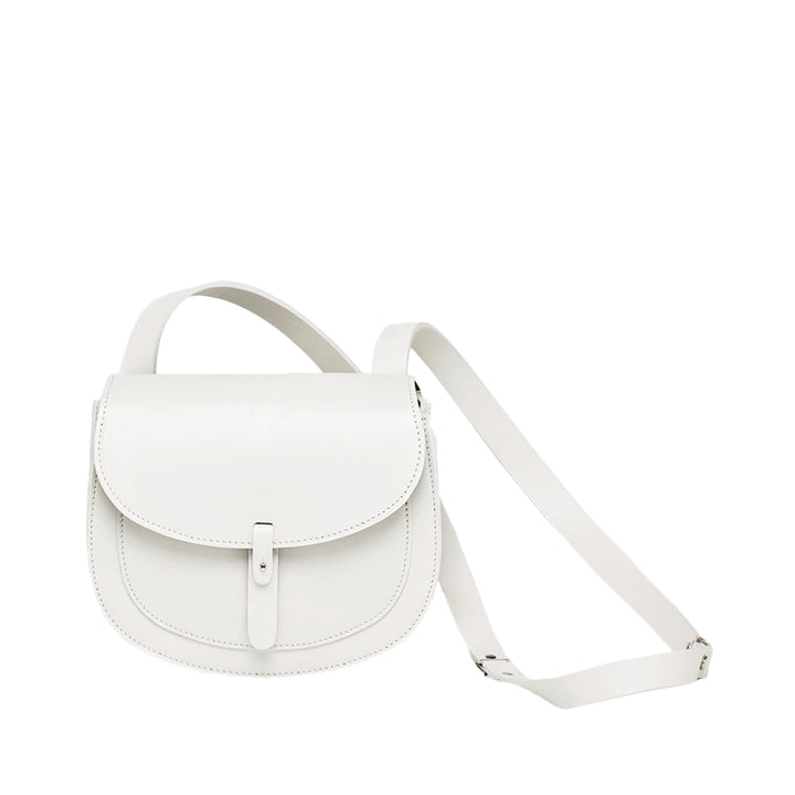 White leather crossbody bag on white background