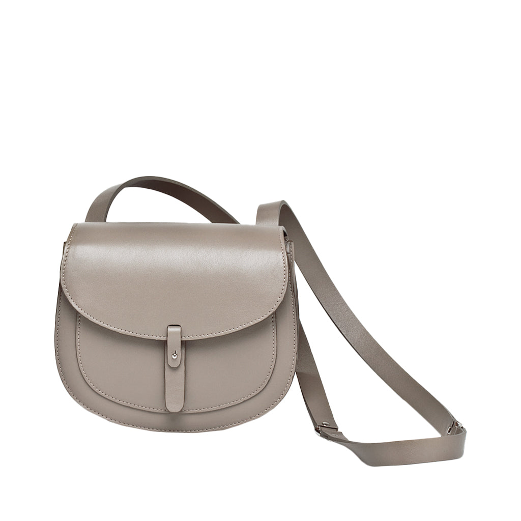 Elegant taupe leather crossbody bag with adjustable strap