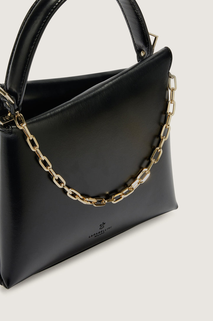 Black leather handbag with gold chain strap and top handle