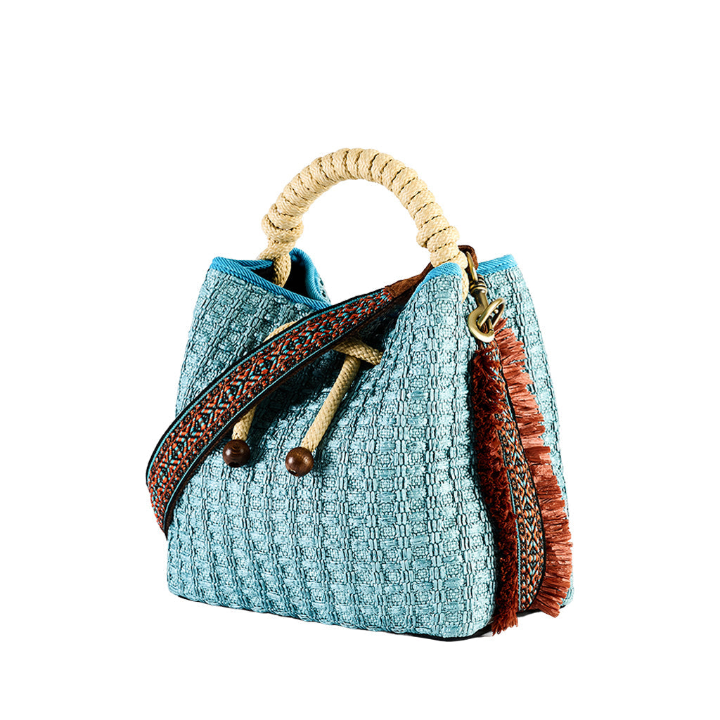 Woven teal handbag with rope handle and decorative strap