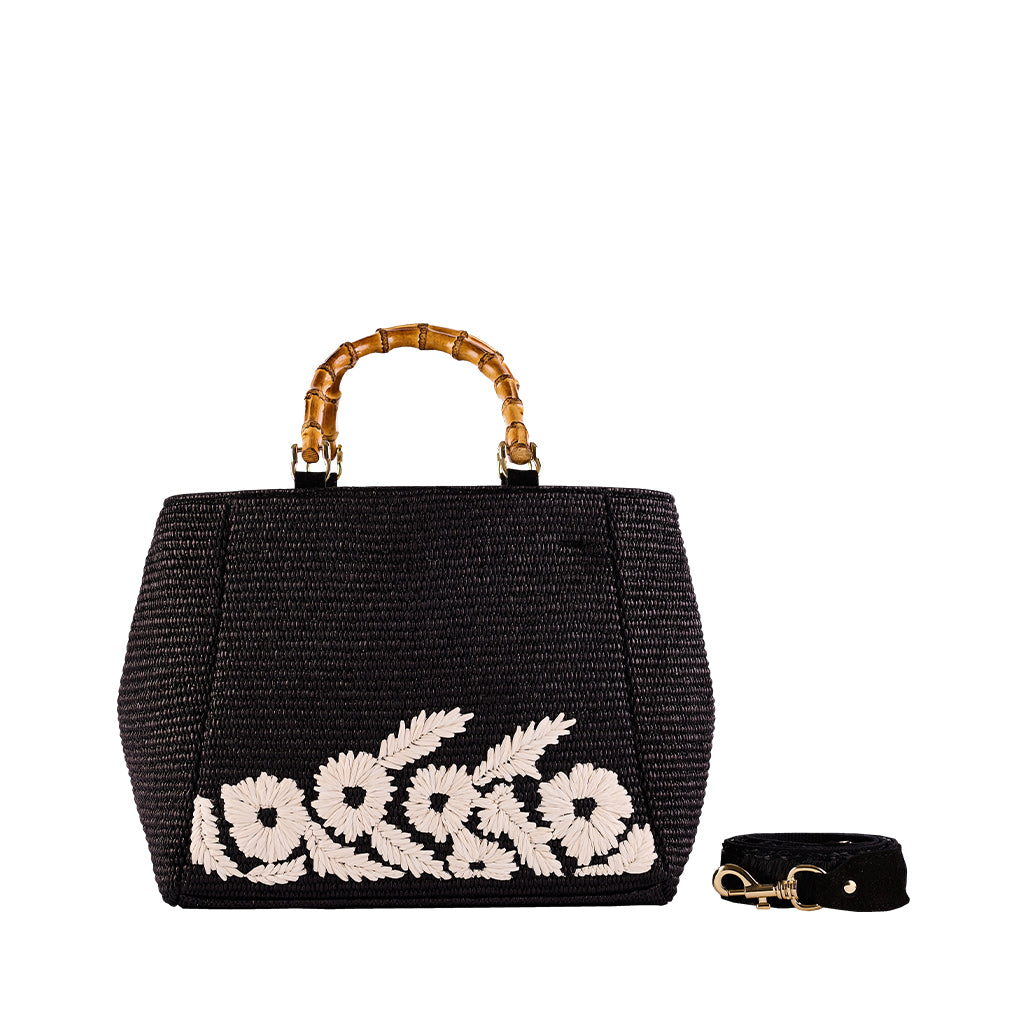 Black woven handbag with floral embroidery and bamboo handle