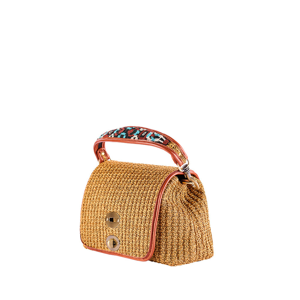 Handmade woven straw handbag with patterned top handle and button closure