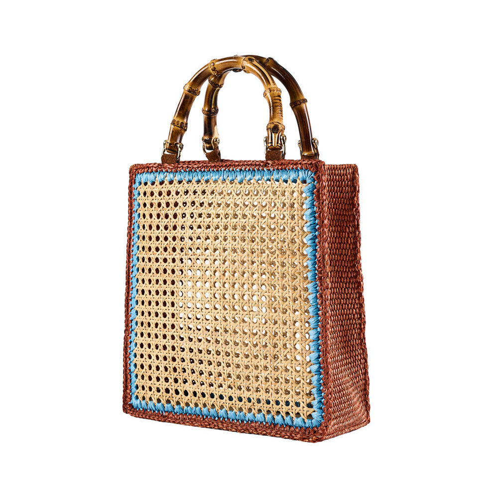 Handwoven rattan tote bag with bamboo handles and blue trim