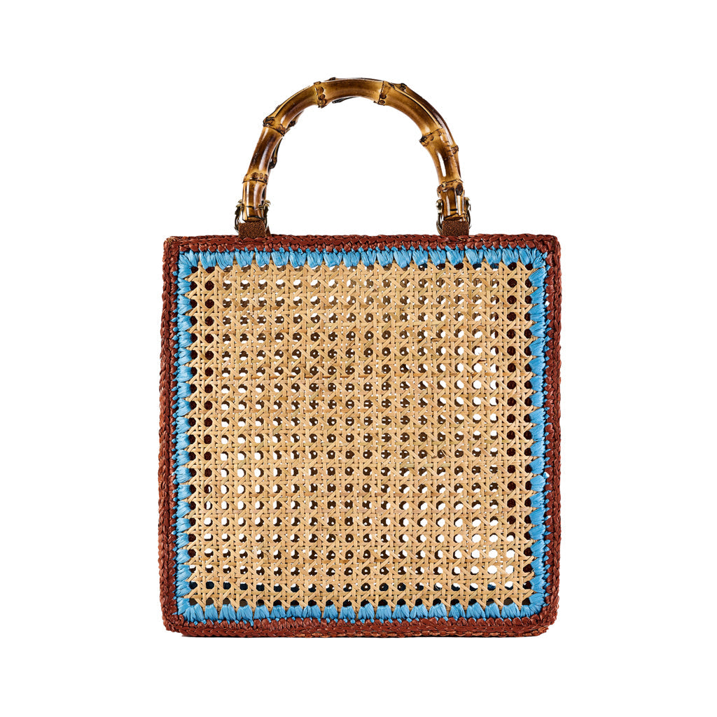 Handwoven wicker handbag with bamboo handle and blue trim