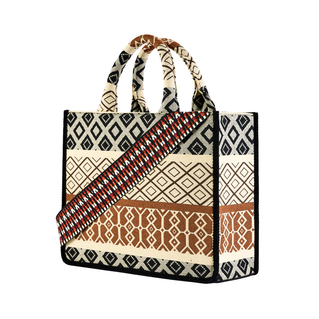 Woven geometric patterned tote bag with a colorful shoulder strap