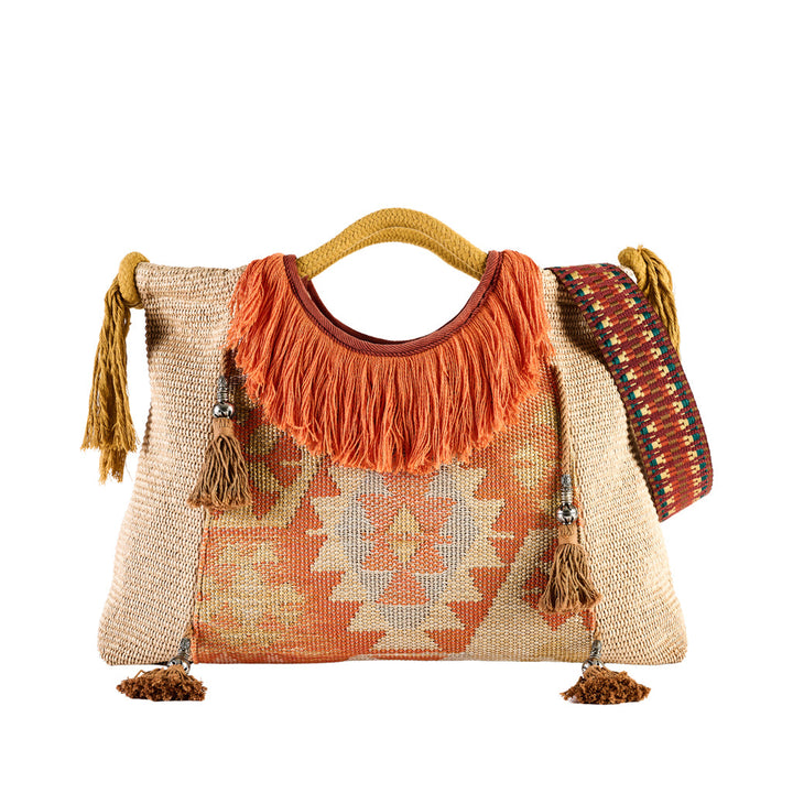 Boho chic woven tote bag with ethnic patterns and fringe detailing