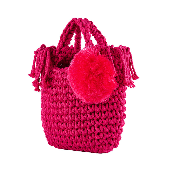 Bright pink handmade crocheted handbag with pompom embellishment