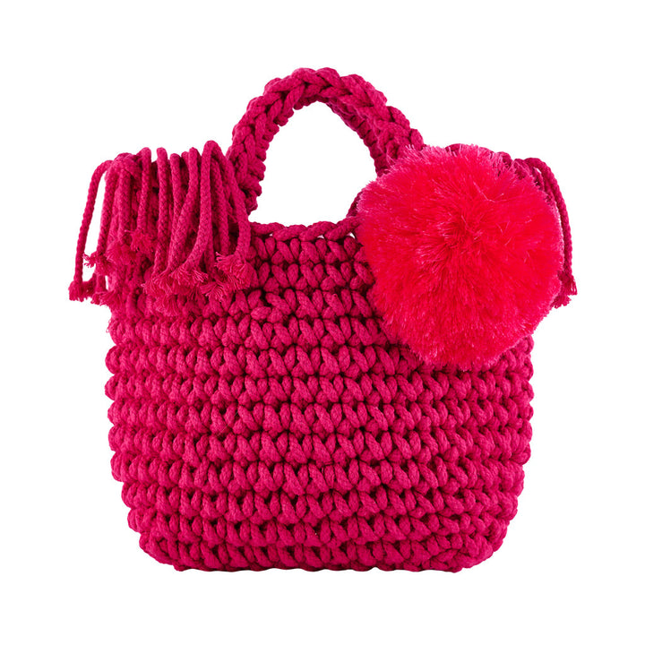 Bright pink hand-knitted tote bag with pom-pom and fringe detailing