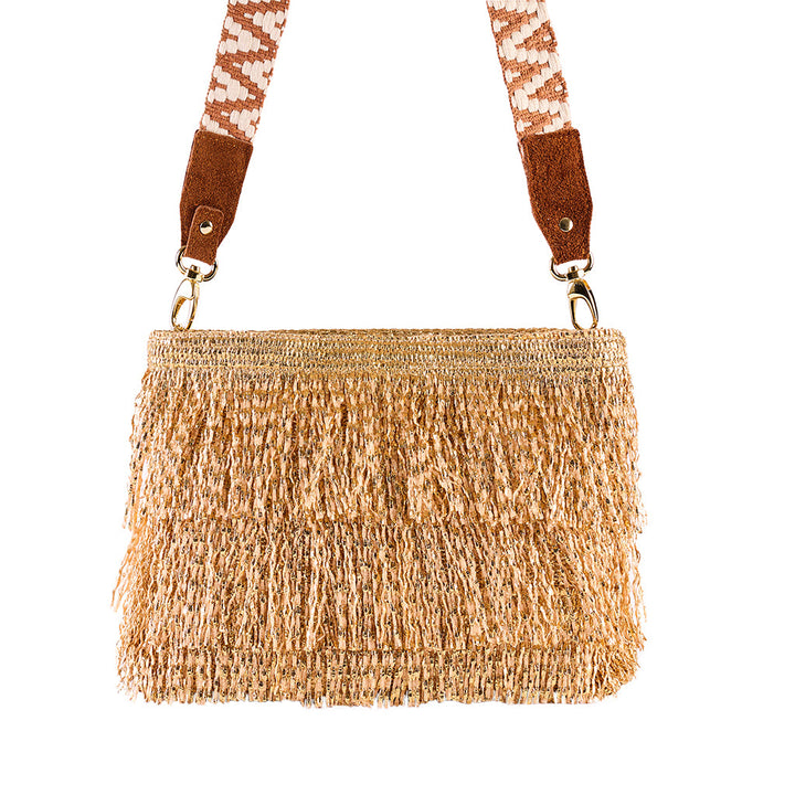 Woven straw handbag with decorative fringe and patterned strap