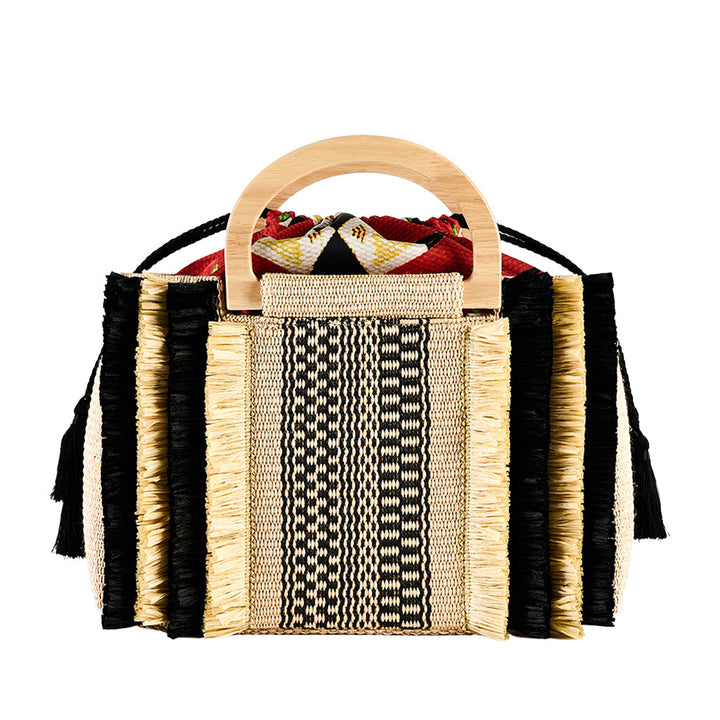 Colorful woven handbag with fringe details and wooden handles