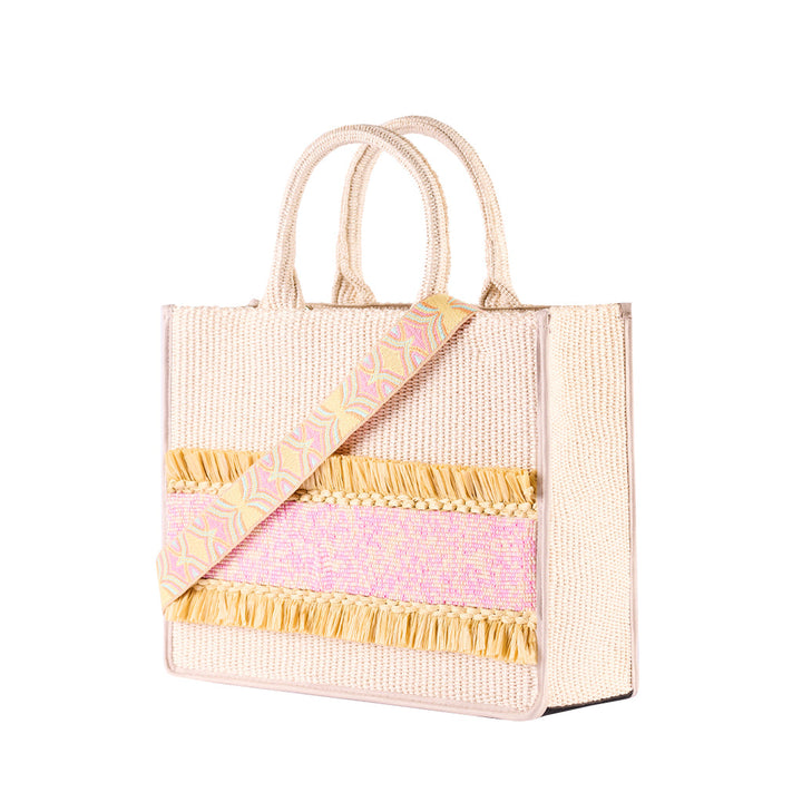 Stylish woven straw handbag with pink and yellow accents and handle and strap