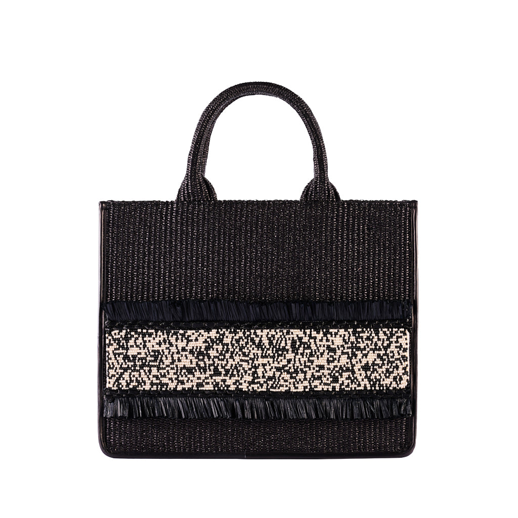 Black woven tote bag with fringe accents and a white patterned stripe