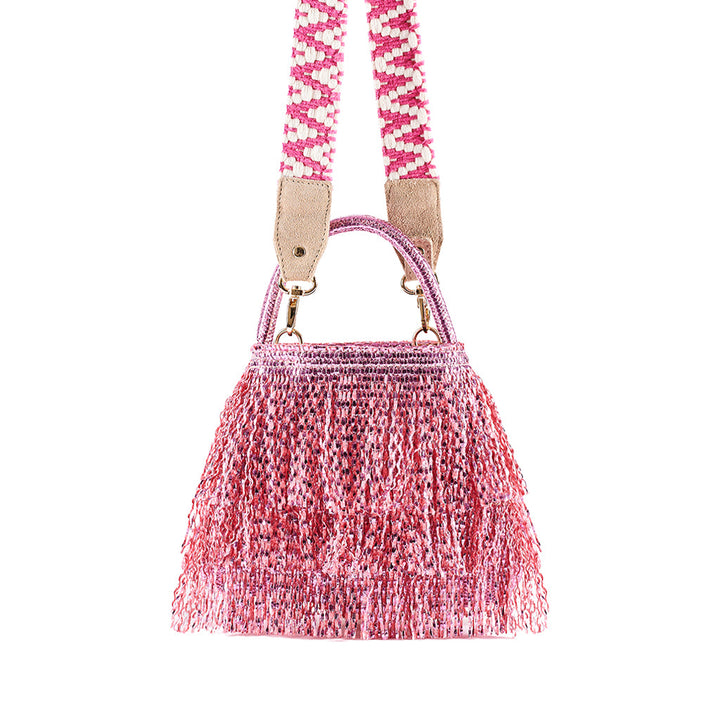 Pink beaded handbag with intricate strap detail