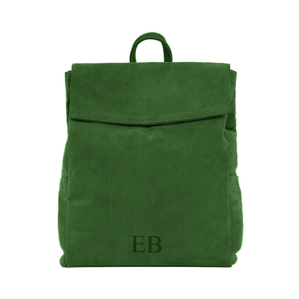 Green suede backpack with monogrammed EB initials on the front flap