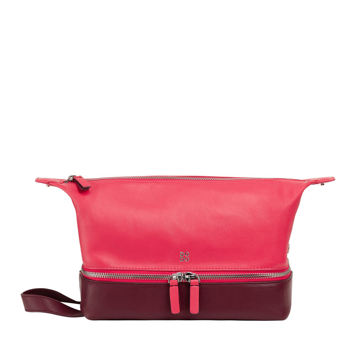 Pink and burgundy leather womenâ€™s handbag with two zipper compartments and wrist strap