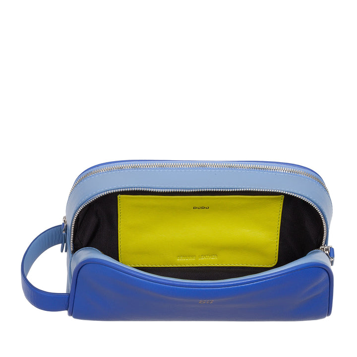 Blue leather crossbody bag with open zipper revealing lime green interior pocket