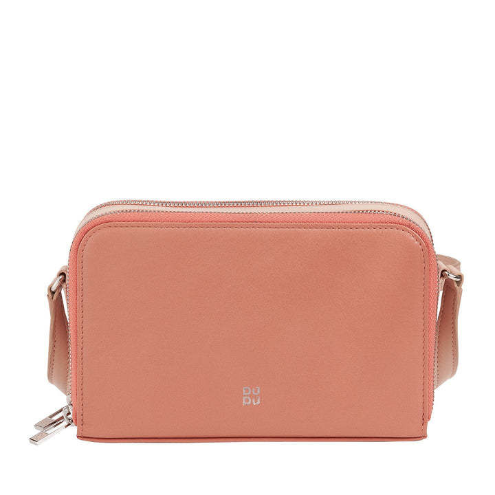 Pink leather crossbody bag with silver zipper and adjustable strap