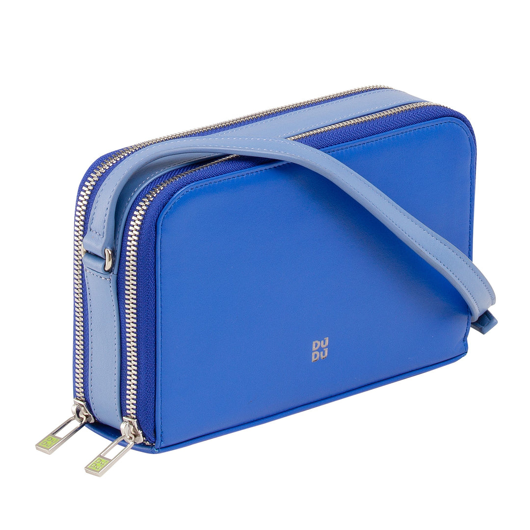 Blue leather crossbody bag with dual zippers and shoulder strap