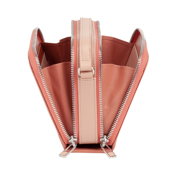Pink leather crossbody bag with multiple compartments and zippers