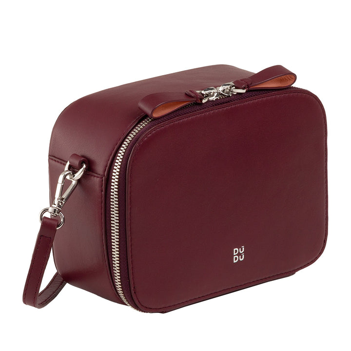 Burgundy leather crossbody bag with silver zipper and strap