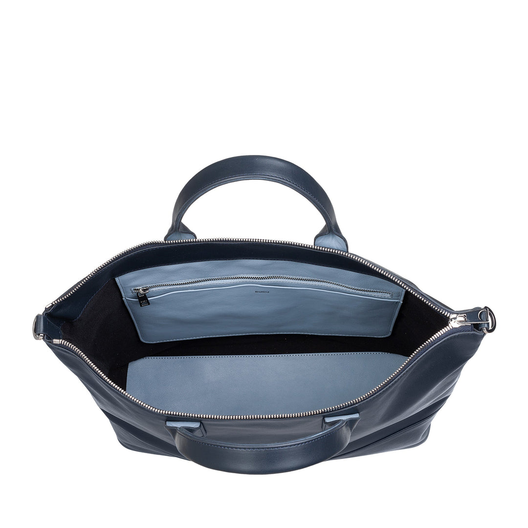 Open navy blue leather handbag with interior zippered pocket and compartments