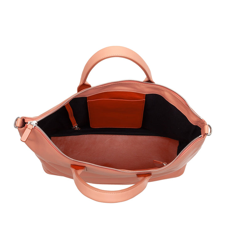 Open tan leather handbag showing interior compartments and zipper detail