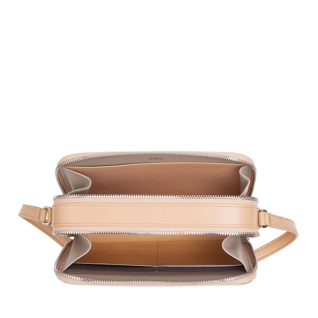 Beige double-zip crossbody leather handbag with open compartments
