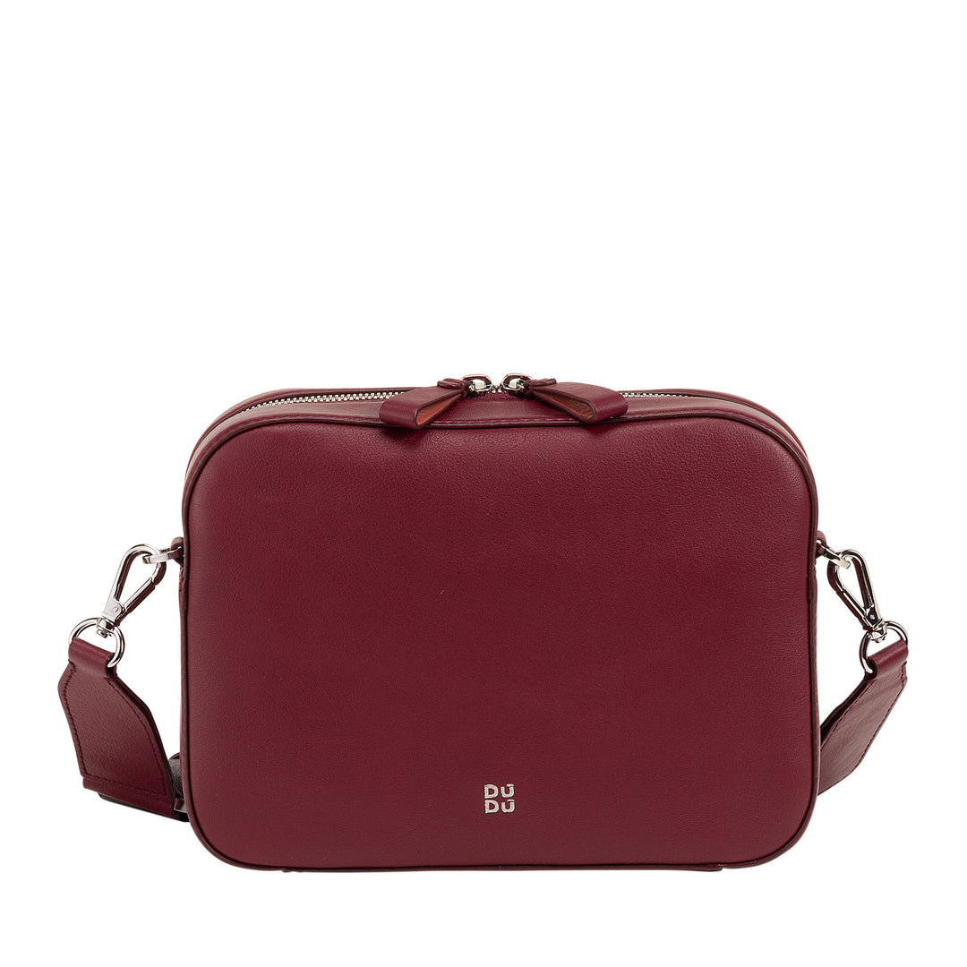 Maroon leather crossbody handbag with silver hardware and adjustable strap