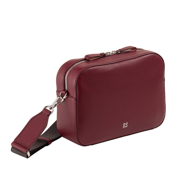 Burgundy leather crossbody bag with silver zipper and adjustable strap