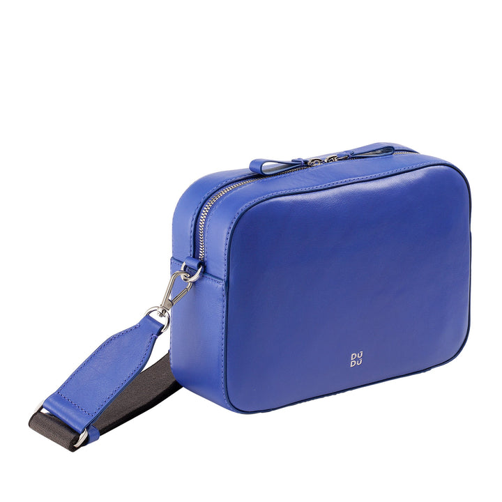 Blue leather crossbody bag with detachable strap and silver zipper