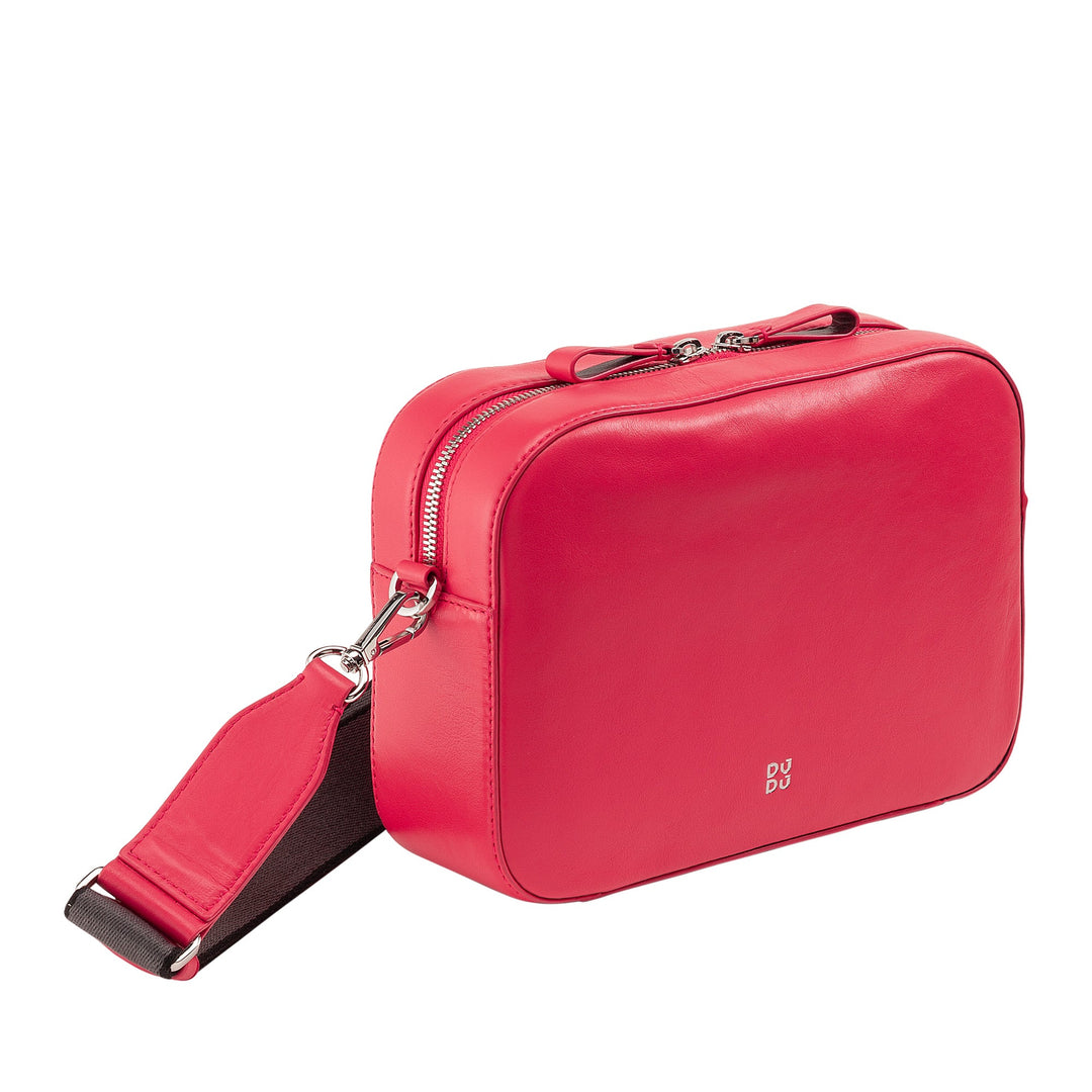 Red leather crossbody bag with adjustable strap and silver zipper