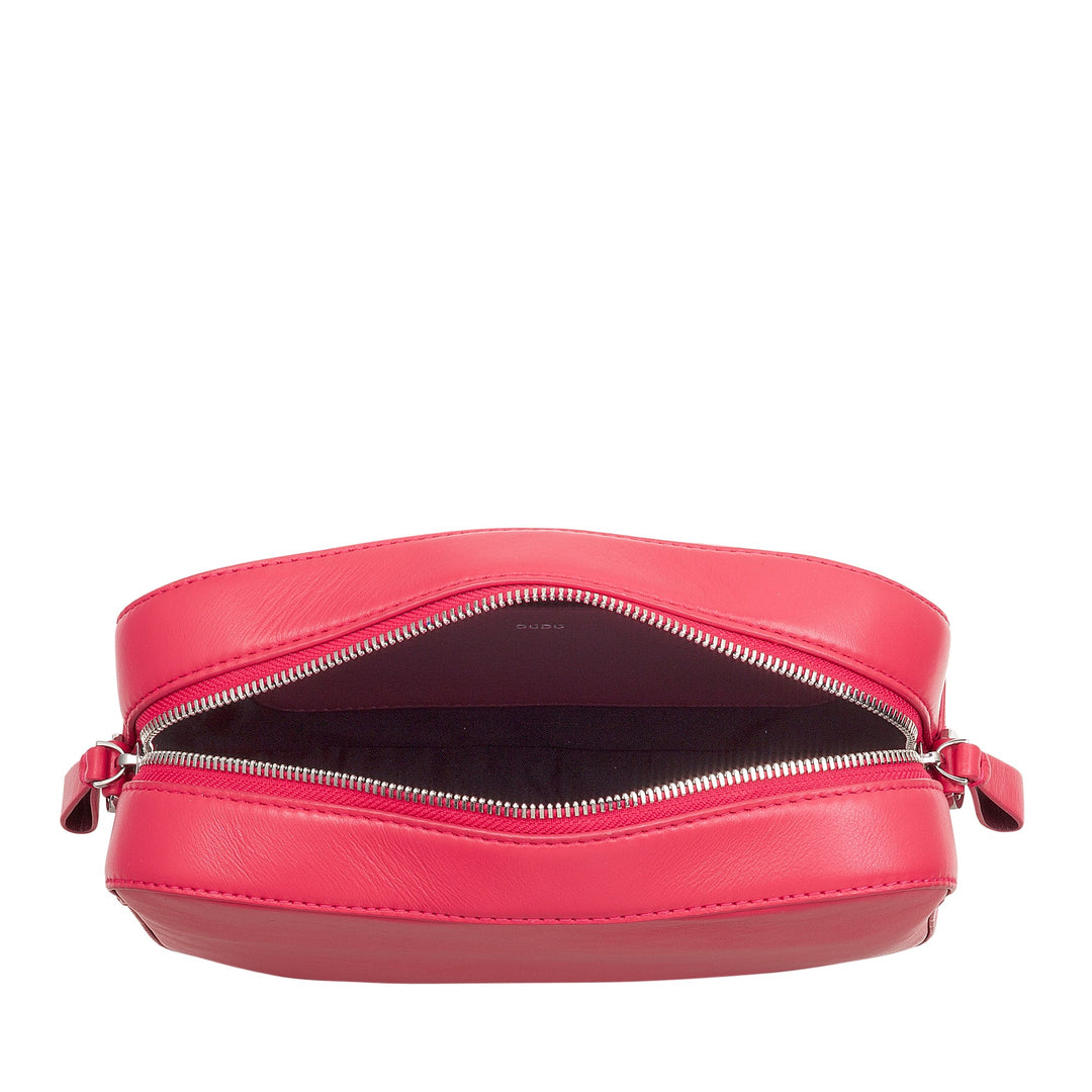 Open pink leather crossbody bag with metal zippers