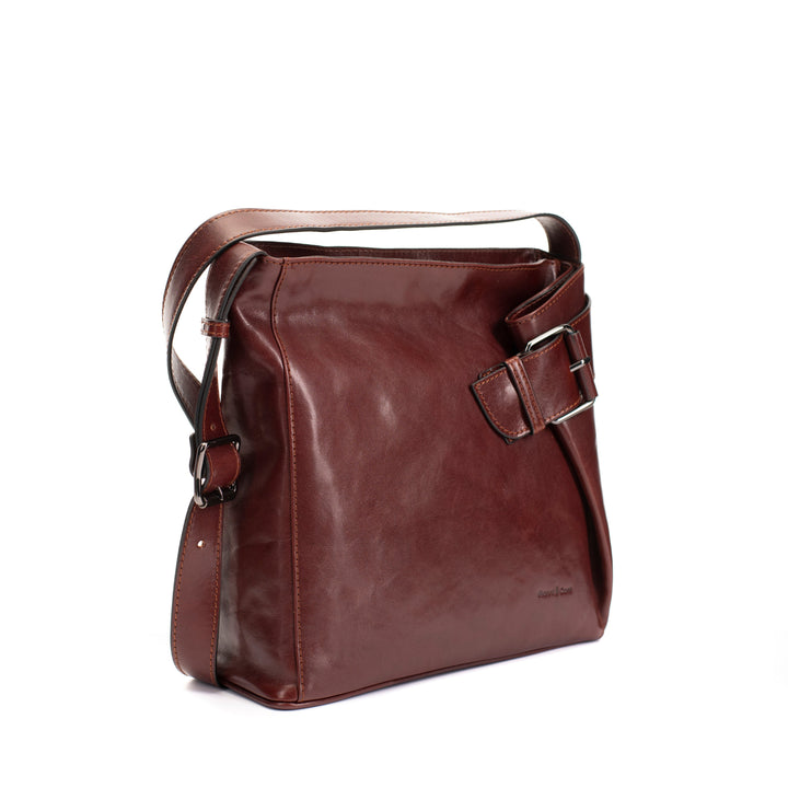 Elegant brown leather shoulder bag with adjustable strap and side buckle