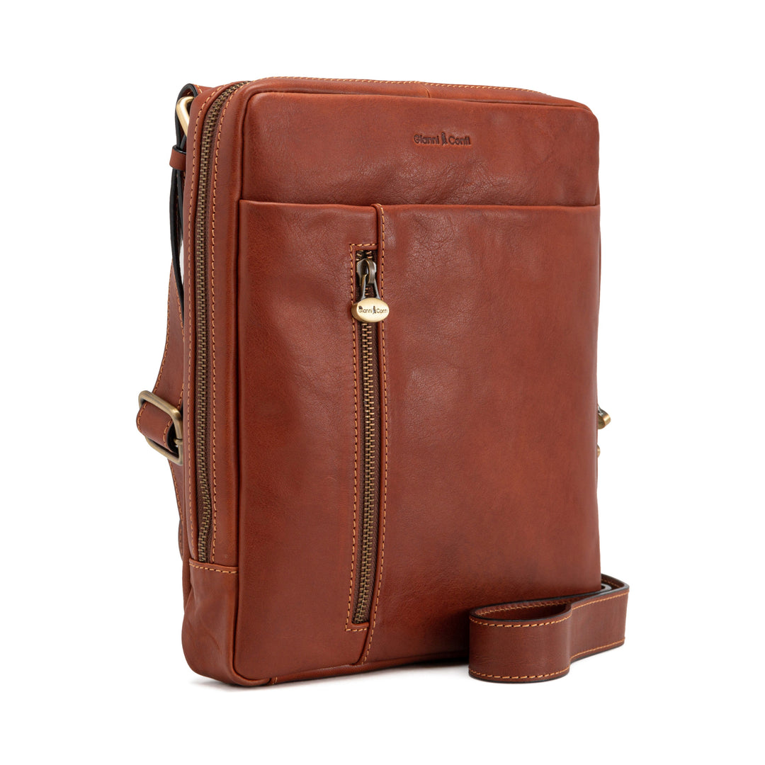 brown leather crossbody bag with front zipper pocket