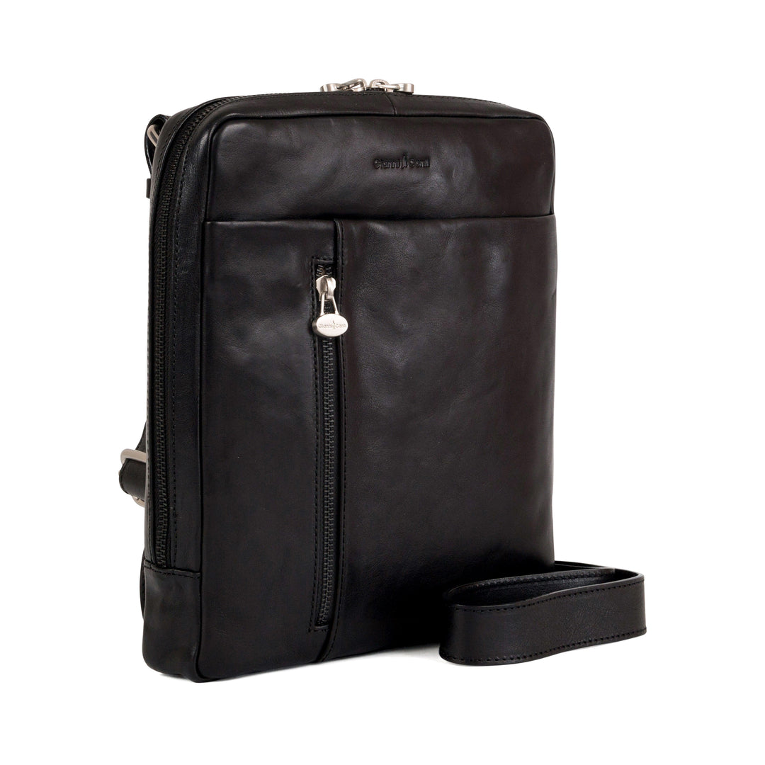 Black leather crossbody bag with front zipper pocket and shoulder strap