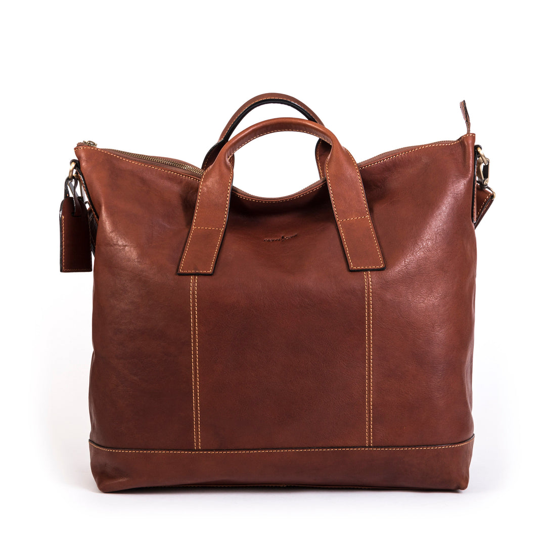 Brown leather handbag with handles and shoulder strap