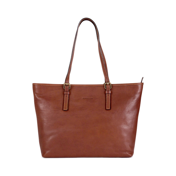 Brown leather tote bag with double handles and gold buckles