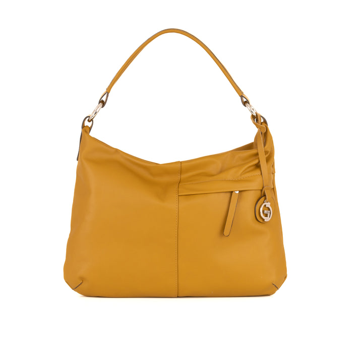 Mustard yellow leather handbag with shoulder strap and decorative charm