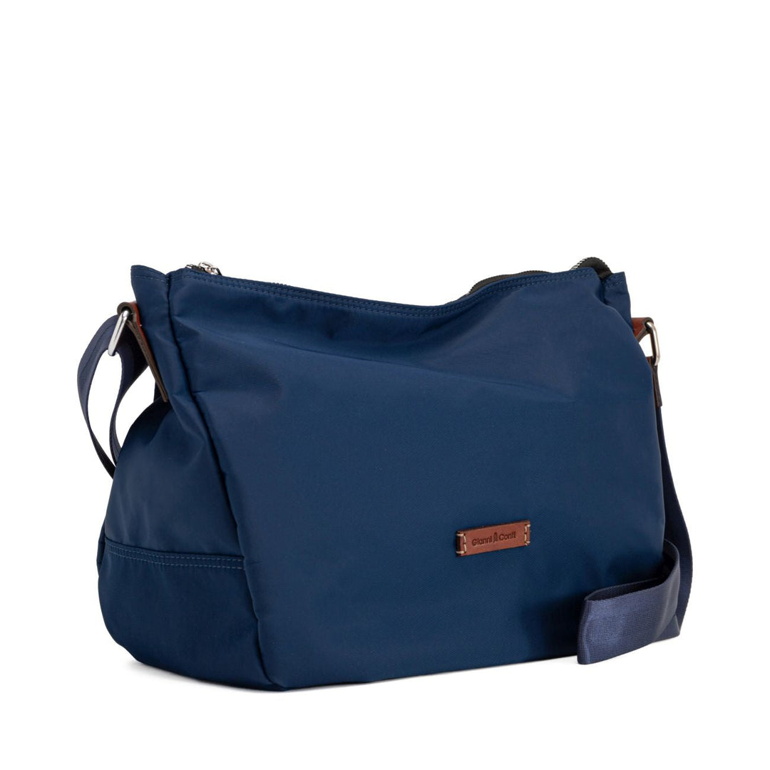 Stylish navy blue crossbody bag with adjustable strap